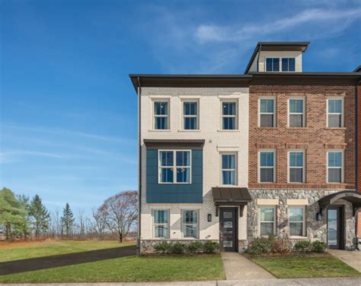 Americana Centre Condominiums and Townhomes for Sale • The Rockville Real Estate Exchange